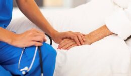 medical doctor comforting senior patient medical doctor comforting senior patient